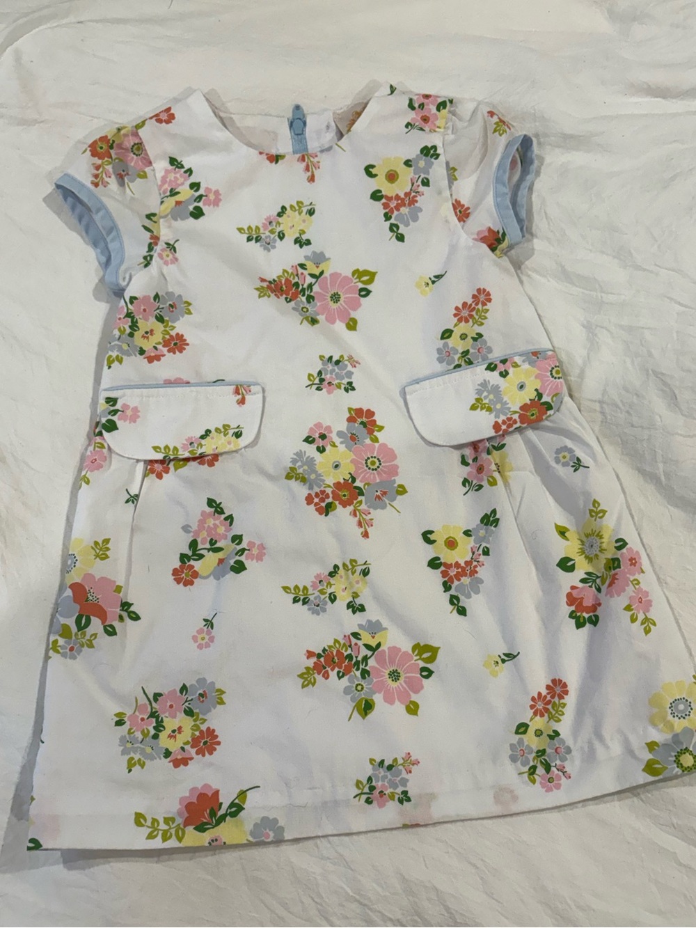 The Beaufort Bonnet Company White Floral Girls Dress with Blue Trim